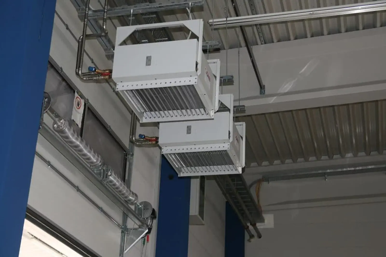 ONI-warmteterugwinningsinstallatie in een productiehal